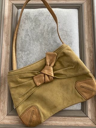 Cartera de mano de piel