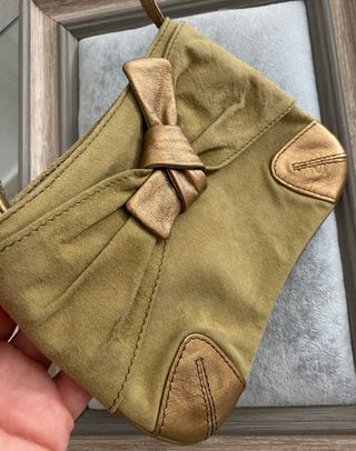 Cartera de mano de piel