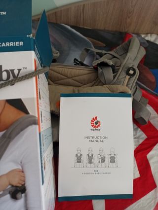 Mochila porteo ergobaby+adaptador bebé 