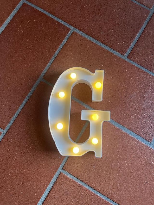 abat-jour a forma lettera G