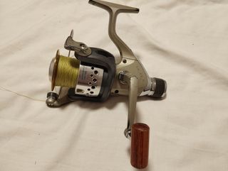 Carrete pesca+ bovina adicional 