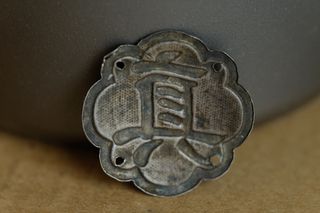 Chapa de plata antigua.