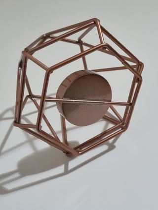 Portacandela in ferro forma geometrica