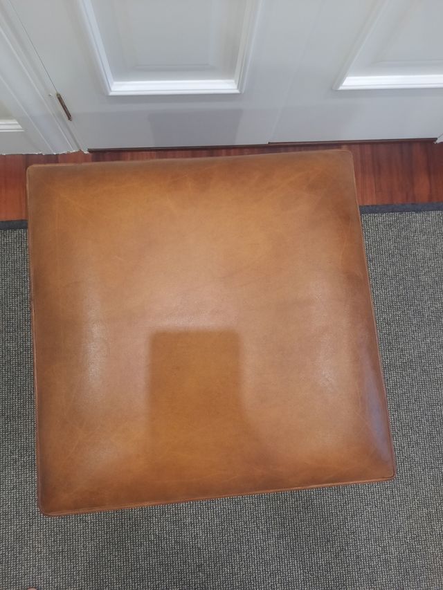 Pareja puffs reposapies piel