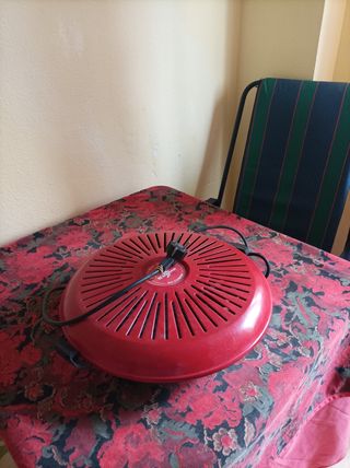 Brasero y mesa camilla vestida