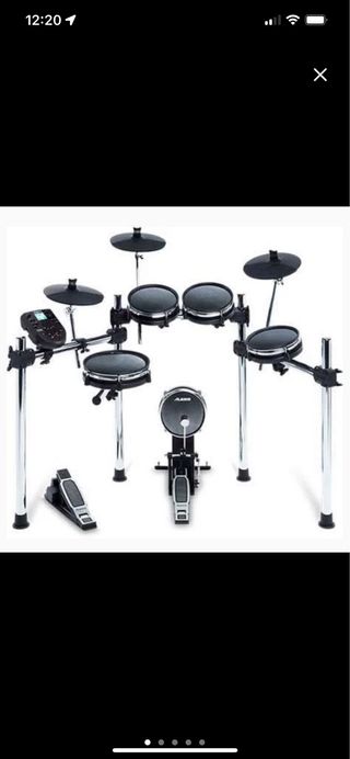 Bateria electronica Alesis + doblepedal TAMA izq