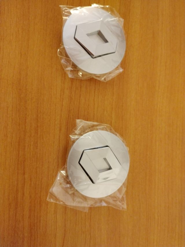 2 tapas de 6 ctm. Renault.