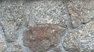 Mortero monocapa y piedras en fachadas