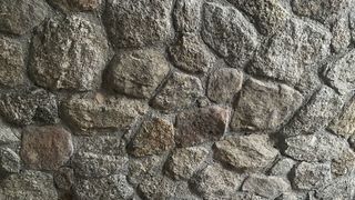 Mortero monocapa y piedras en fachadas