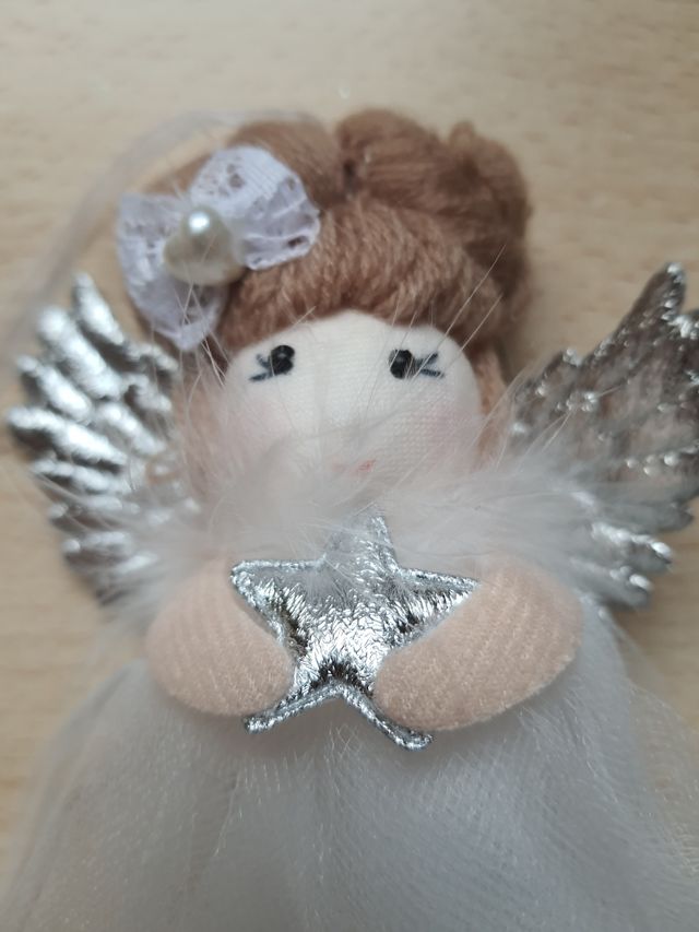 Pendente a forma di angelo