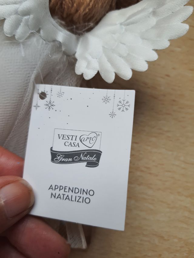 Pendente a forma di angelo