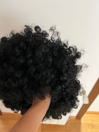 peluca afro. Pero rizado negro . Mucho volumen