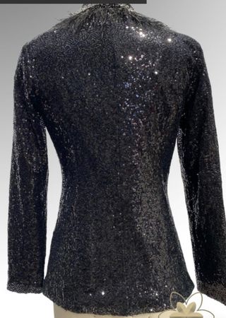 Americana lentejuelas pedreria plumas negra