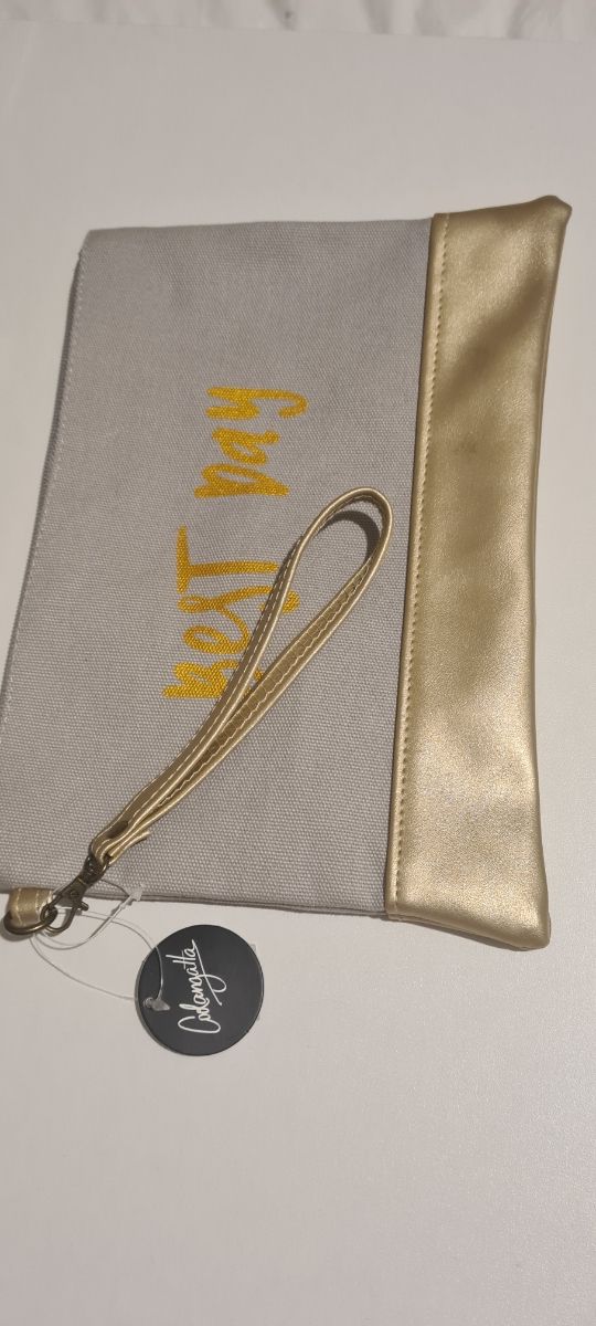 Bolso de mano gris y dorado