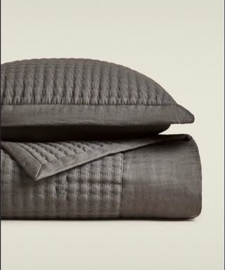 colcha de zara home gris