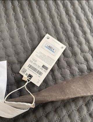 colcha de zara home gris