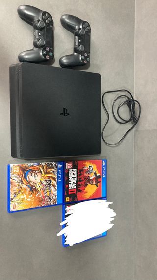 PlayStation4 con juegos y mandos