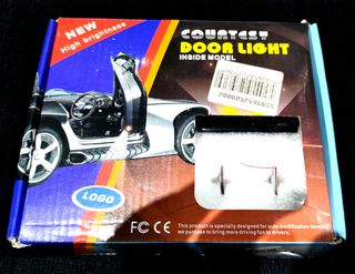 Dos luces LED para puertas de coche logo Batman