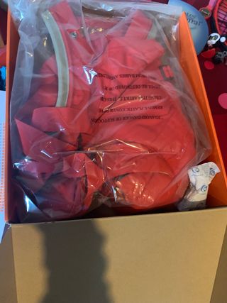 mochila portabebés Stokke roja