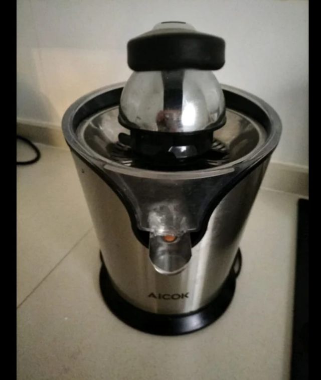 Exprimidor de acero inoxidable