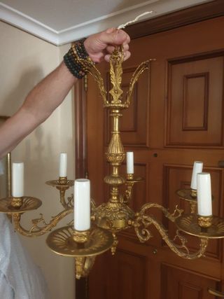 Reloj y candelabros antiguos