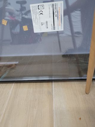 Puerta corredera con cristal Ahumado costó 1500