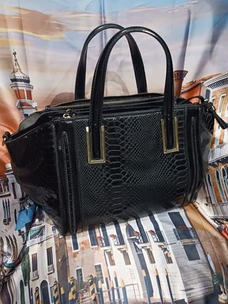 Bolso de serpiente negro de Carpisa 