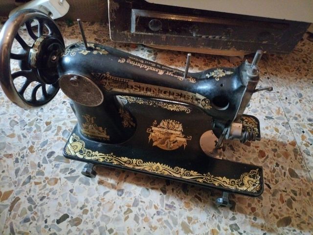 Maquina de coser singer
