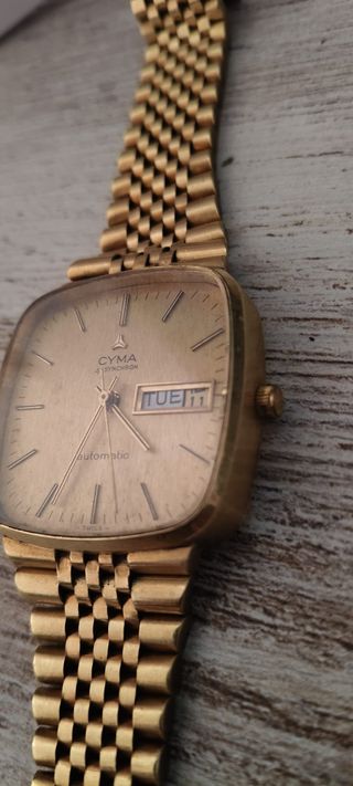 Reloj Cyma by Synchron línea Conquistador de ORO