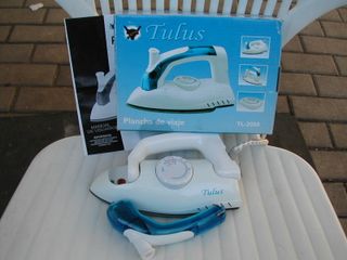 Tendedero y plancha con mesa