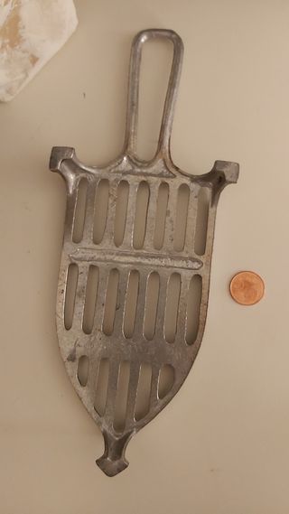 Antigua reposa plancha.