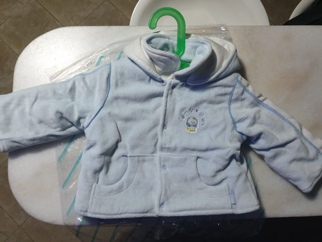 Giubbino con cappuccio staccabile