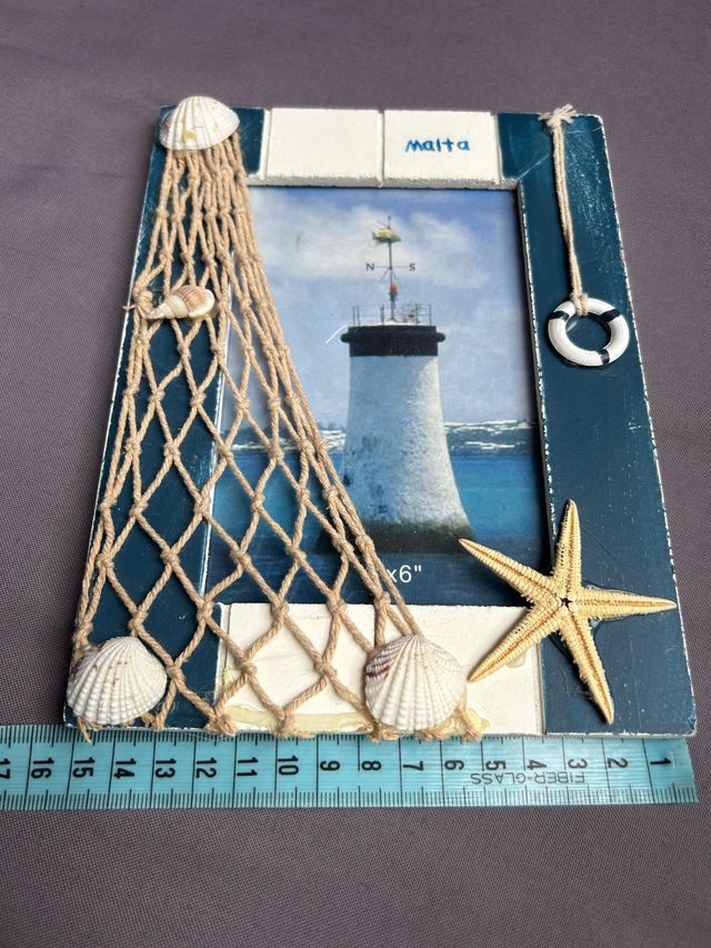 portafoto con conchiglie 