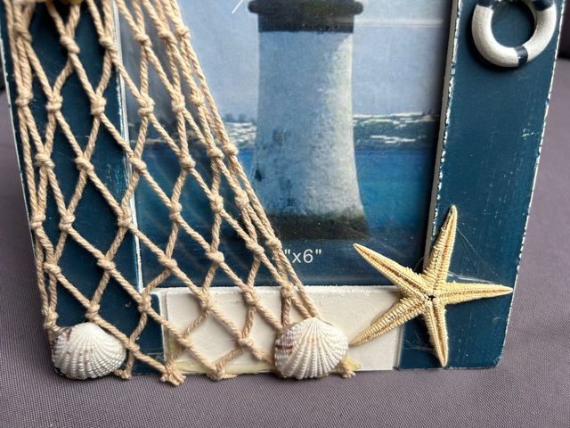 portafoto con conchiglie 
