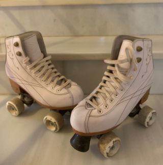 Patines blancos cuatro ruedas Boomerang