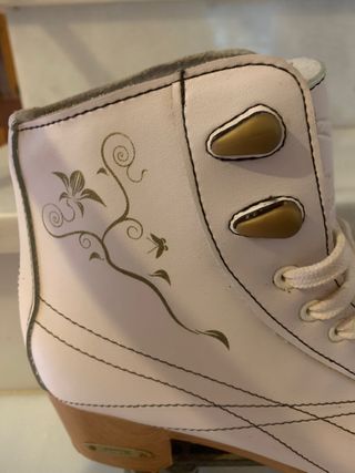 Patines blancos cuatro ruedas Boomerang