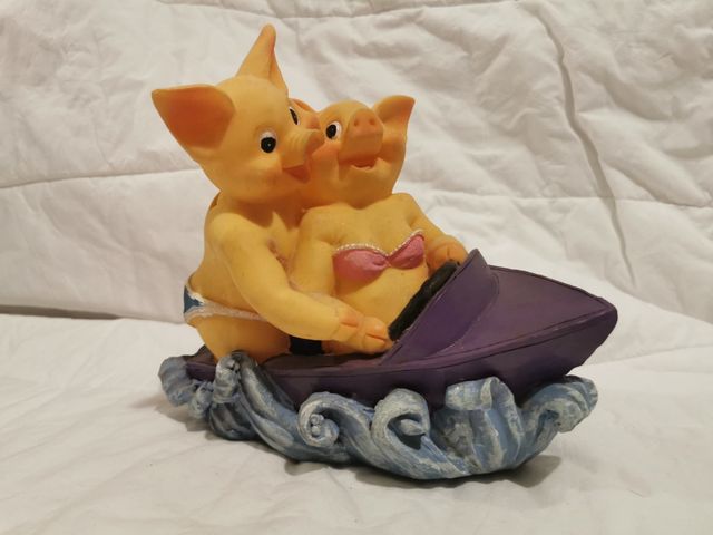 Salvadanaio maialini in barca in love