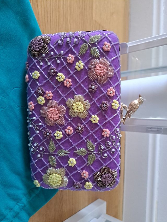 Bolso de fiesta firma Occeanis morado