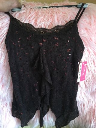 Top punto y lentejuelas