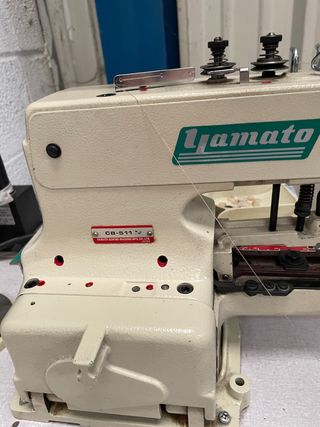 maquina de coser botones