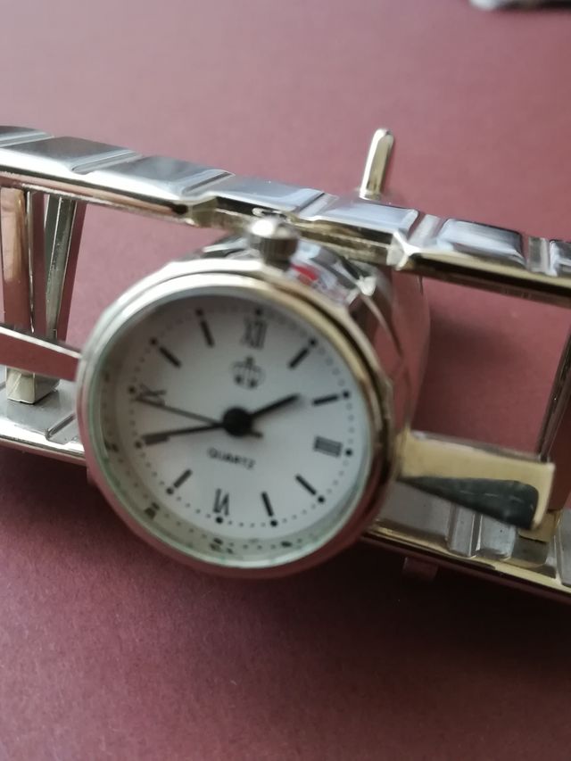 Orologio soprammobile in metallo argento