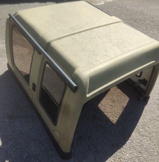 Hard top Suzuki Samurai long body.