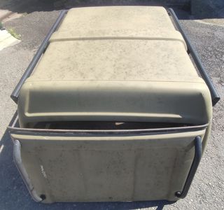 Hard top Suzuki Samurai long body.
