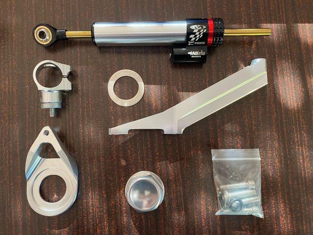 Soporte y amortiguador de dirección r6 1999-2002