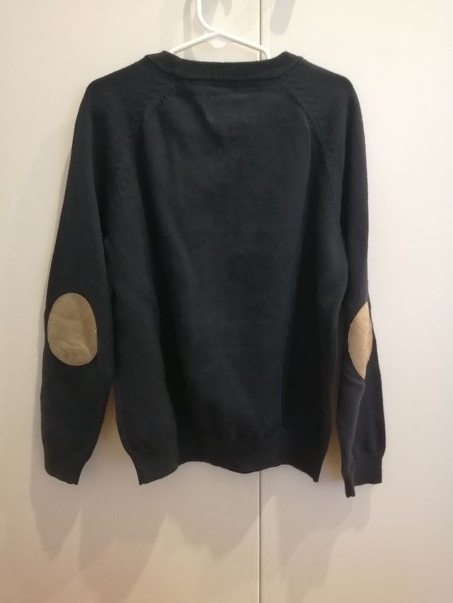 Suéter niño azul marino.Coderas. 7 años