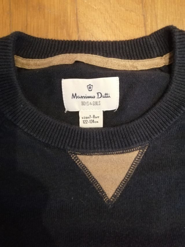 Suéter niño azul marino.Coderas. 7 años
