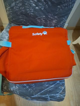 Alzador silla de viaje. Color naranja