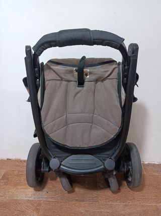 Silla de niño con saco de invierno