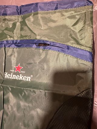 mochila cuerdas cremalleras heineken