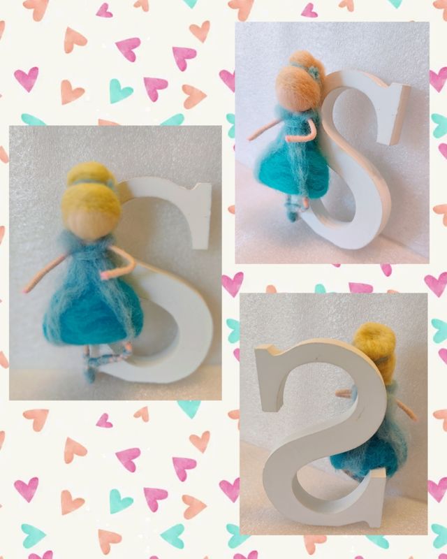 Bambole in lana cardata